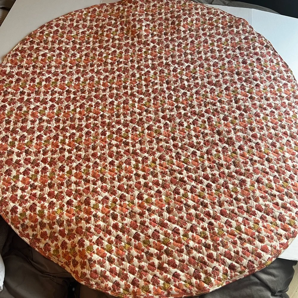 Kate Quinn round quilted play mat in autumn leaves